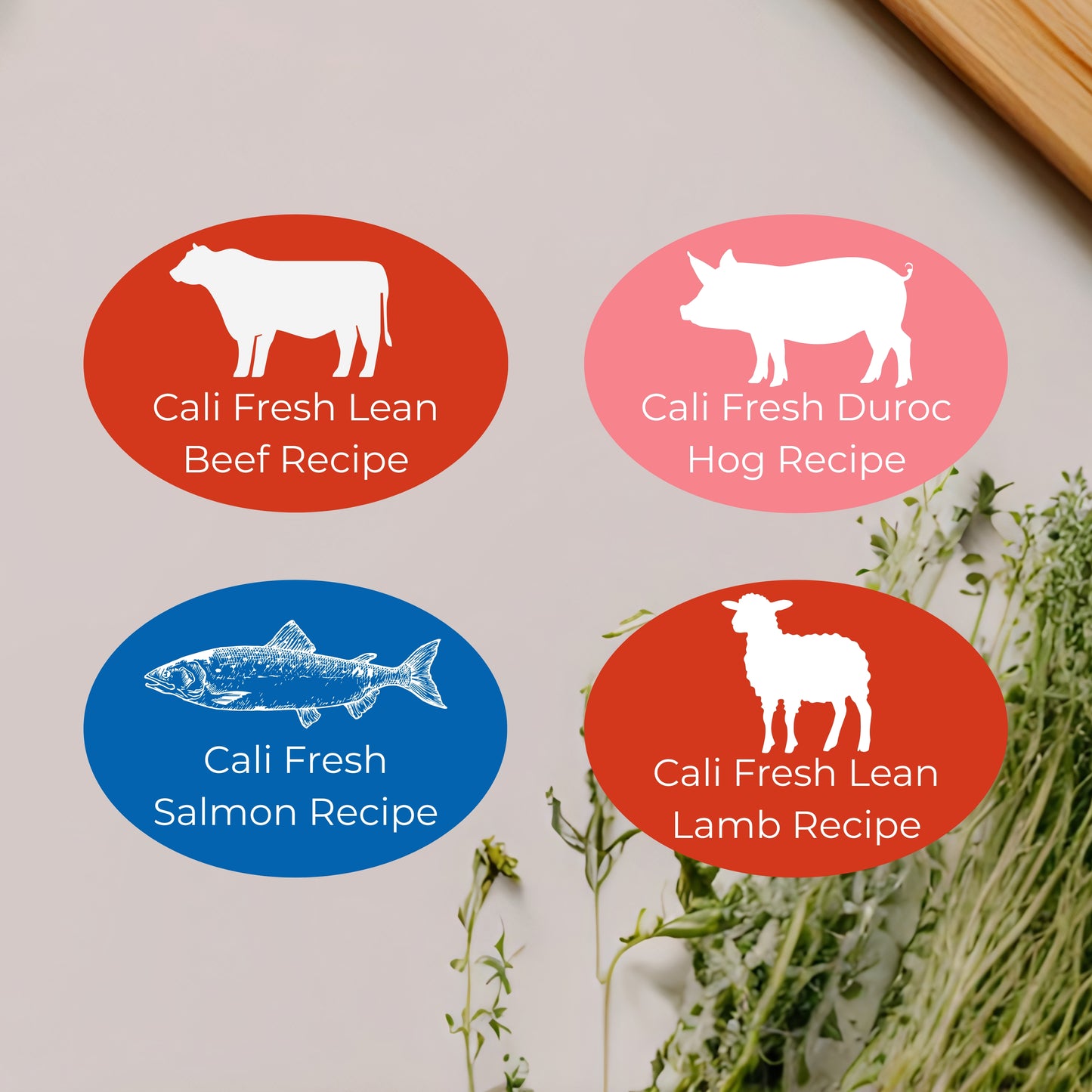 4 ovals with 4 different animal icons indicating the The Nojo's Dog Variety/Sampler Pack which includes Cali Fresh Lean Beef Recipe, Cali Fresh Duroc Hog Recipe, Cali Fresh Salmon Recipe, and Cali Fresh Lean Lamb Recipe